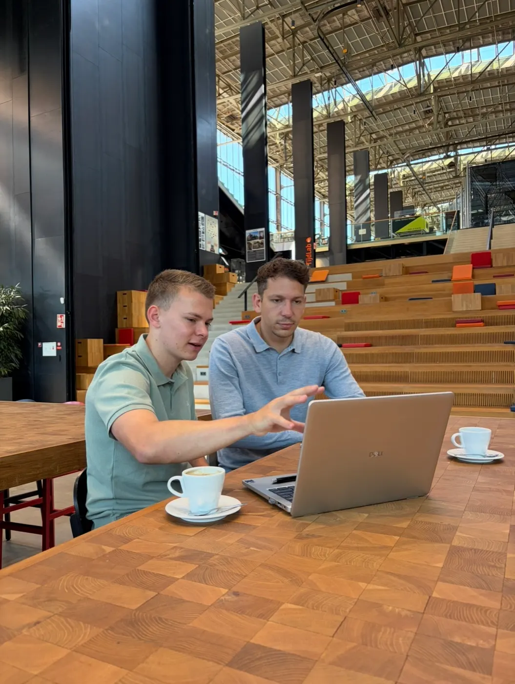Chris Noordhoek and Dennis van der Heijden working at Datavore