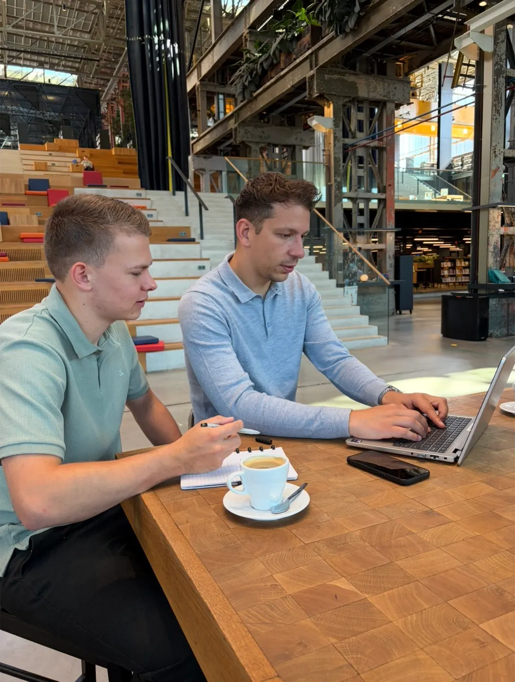 Chris Noordhoek and Dennis van der Heijden working at Datavore