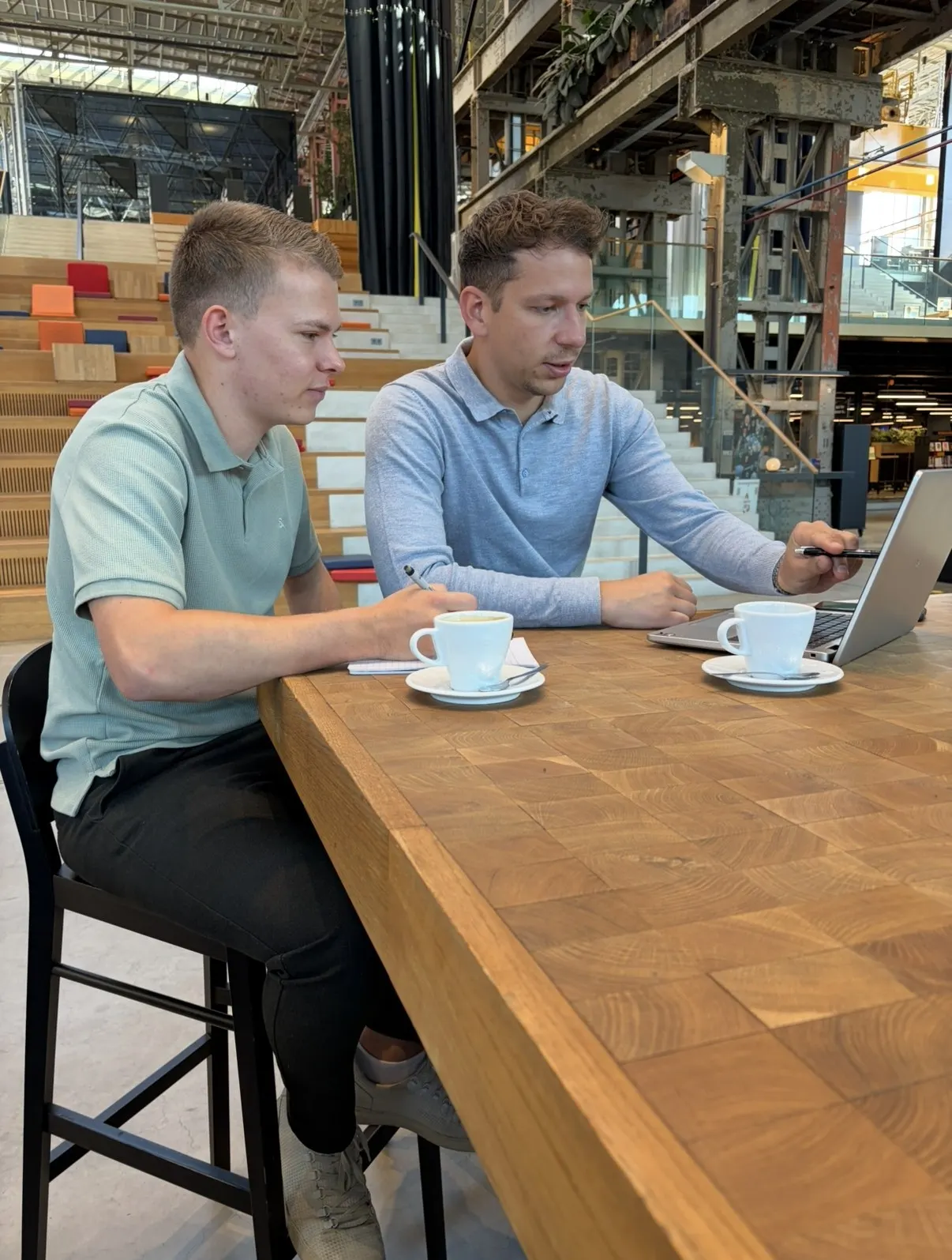 Chris Noordhoek and Dennis van der Heijden working at Datavore